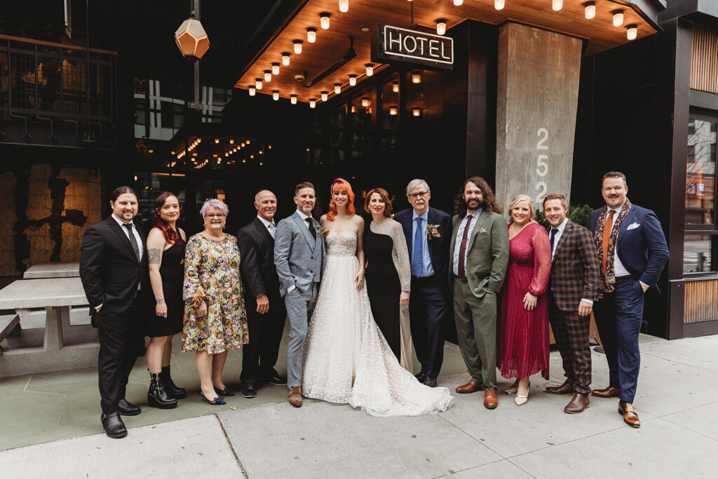 Family of the bride and groom posed together outside of the Ace Hotel in Brooklyn.
